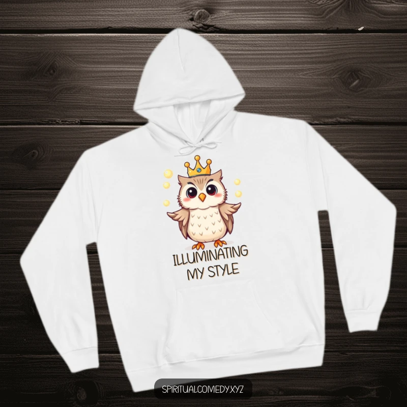 Funny hoodie featuring a crowned owl juggling glowing orbs of light, offering warmth, comfort, and a touch of magic.